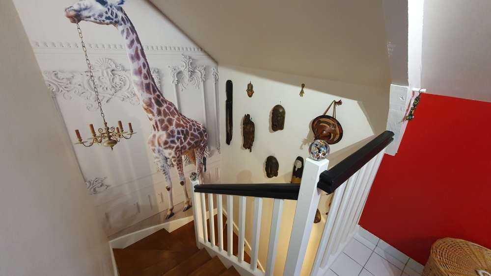 Giraffa con candeliere