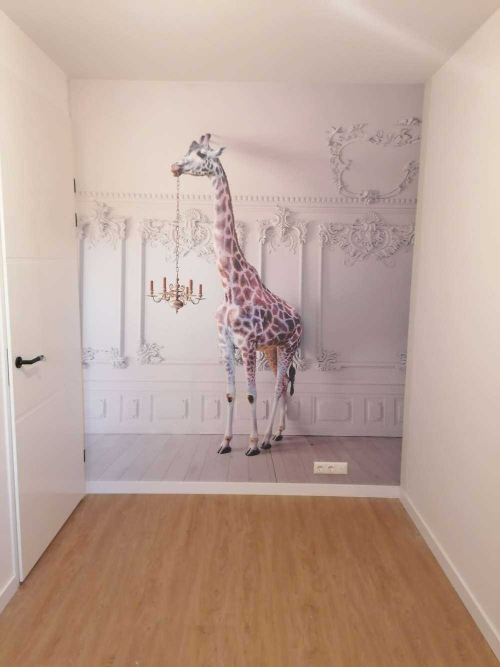 Giraffa con candeliere