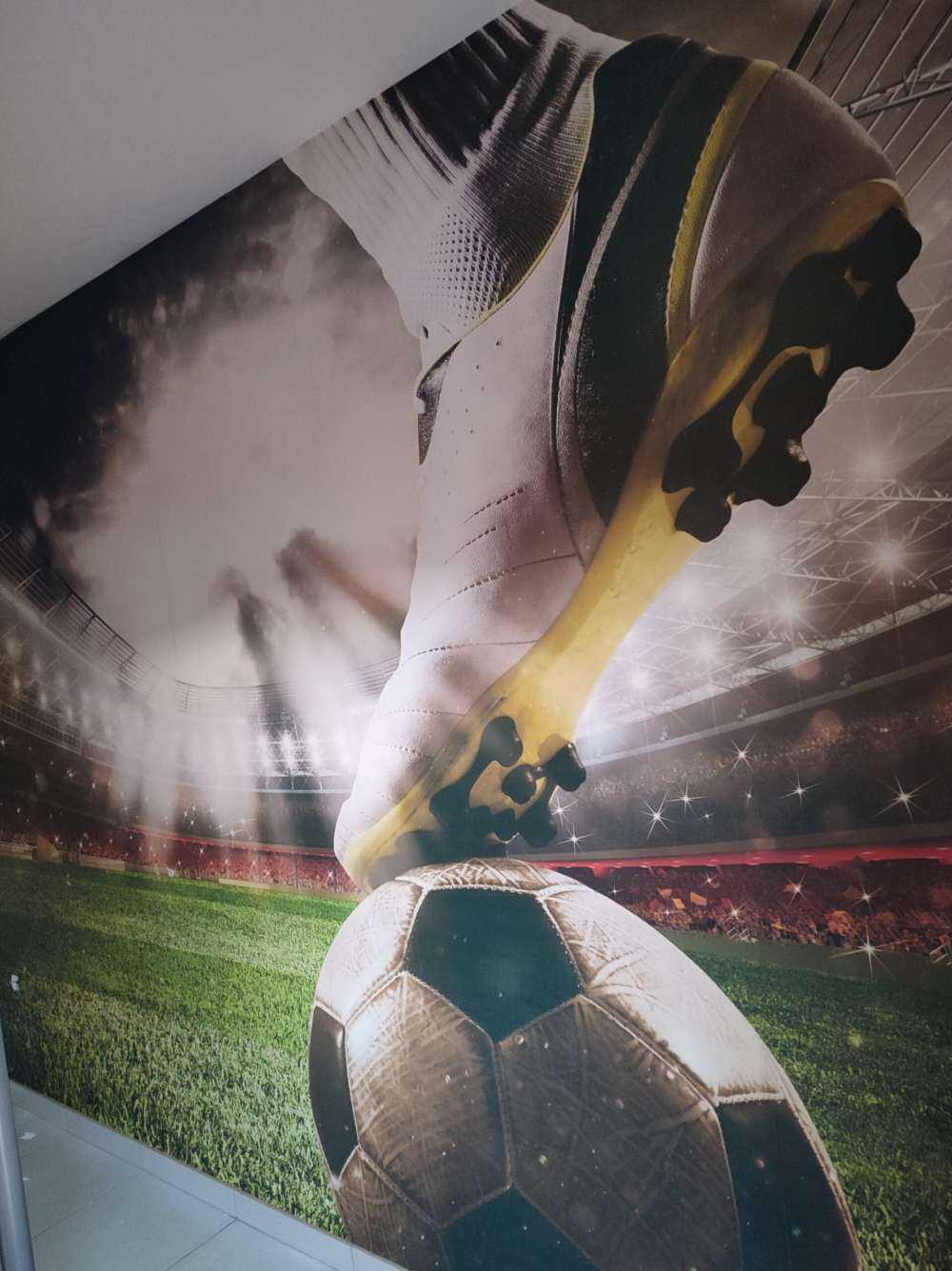 Voetballer in stadion