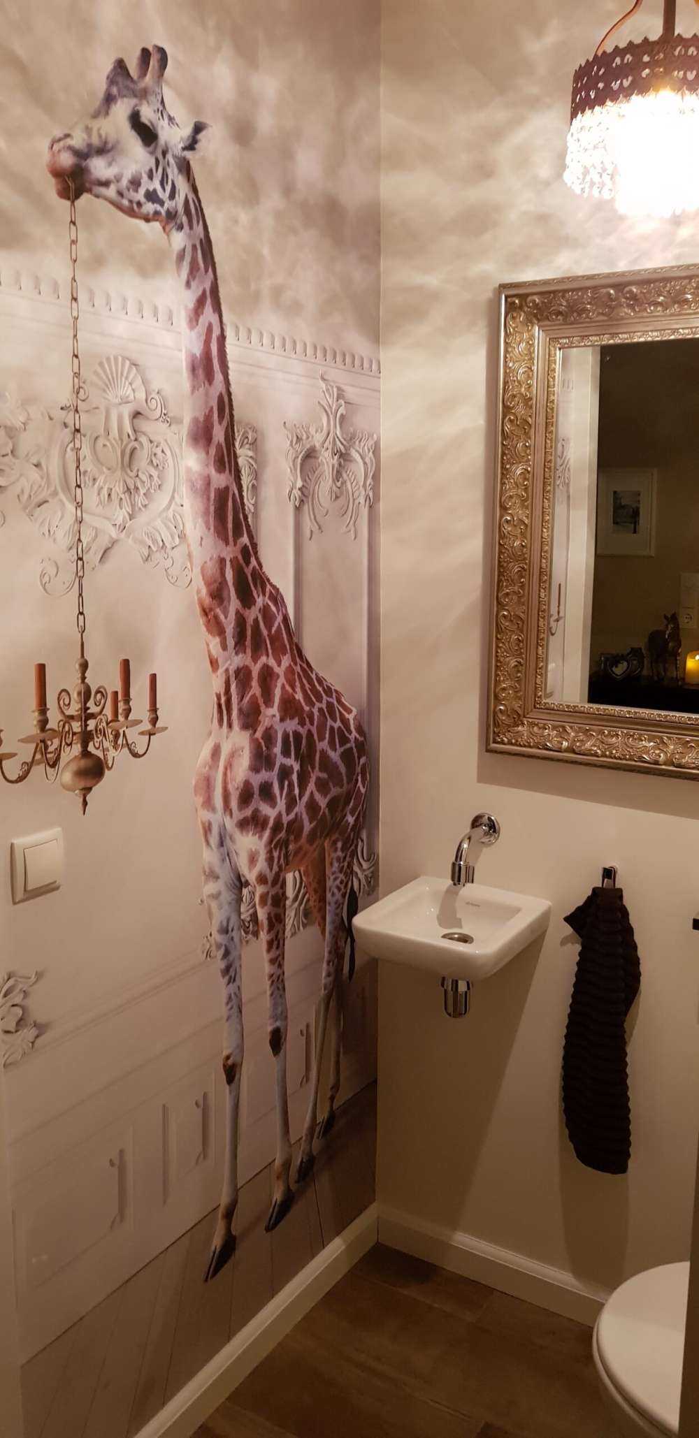 Giraffa con candeliere