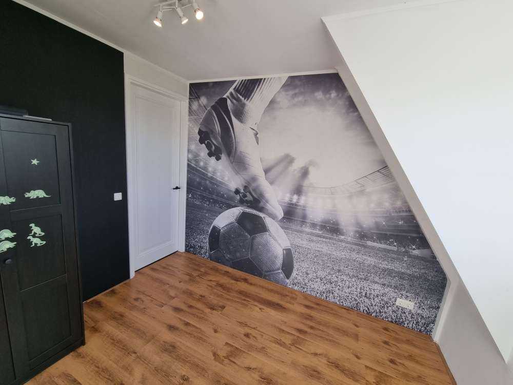 Voetballer in stadion