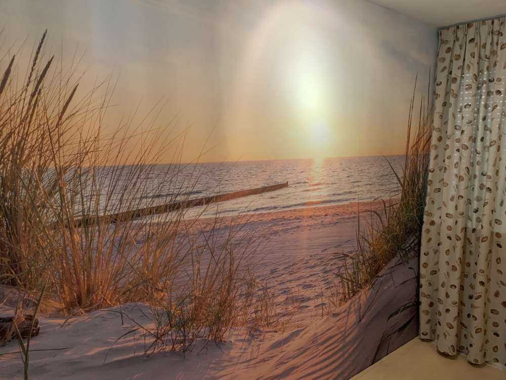 Spiaggia di dune con tramonto