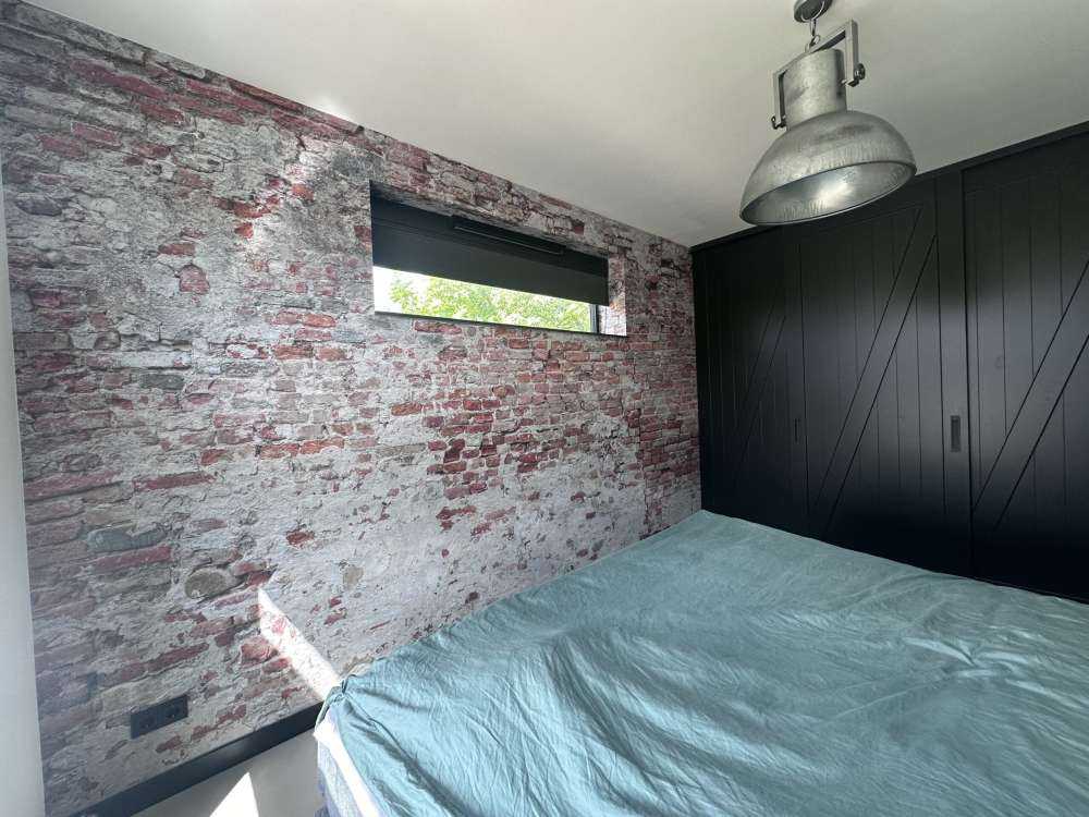 Muro di mattoni in rovina