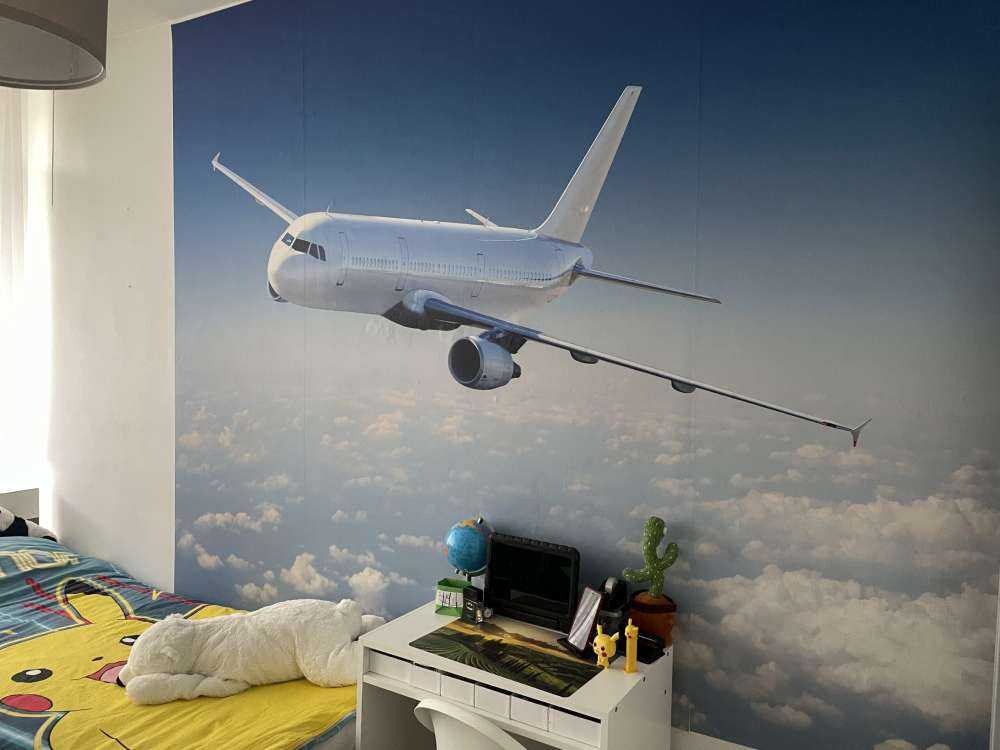 Aereo sopra le nuvole