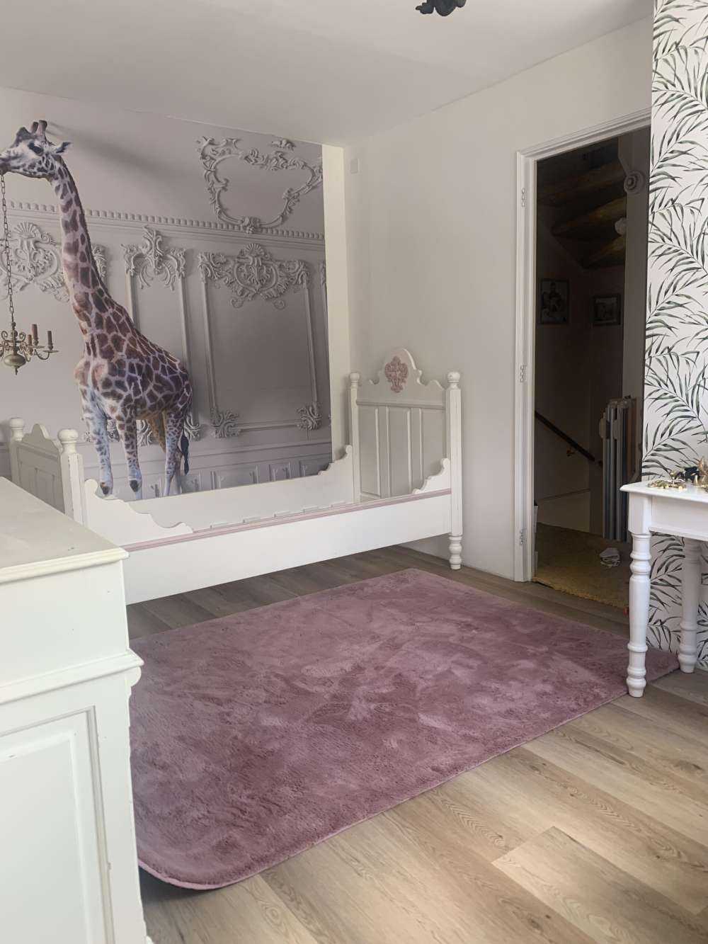 Giraffa con candeliere