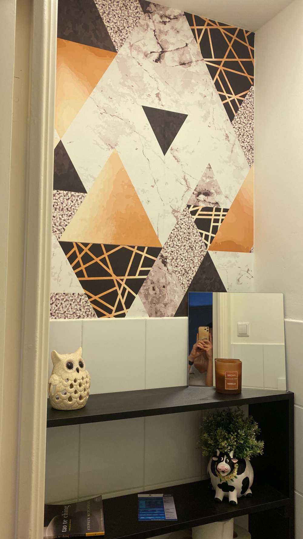 Triangoli di marmo con oro