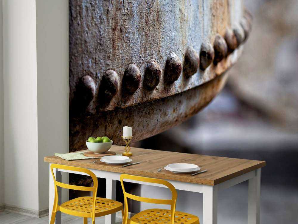 Dettaglio di una caldaia a vapore arrugginita