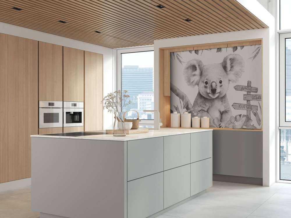 Baby koala nella giungla beige