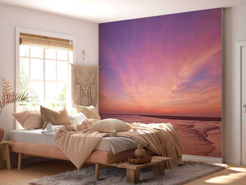 Spiaggia con tramonto rosa