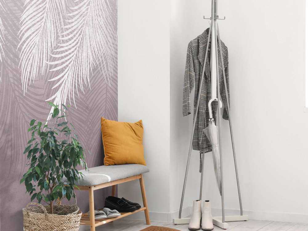 Hojas de palmera sobre hormigón