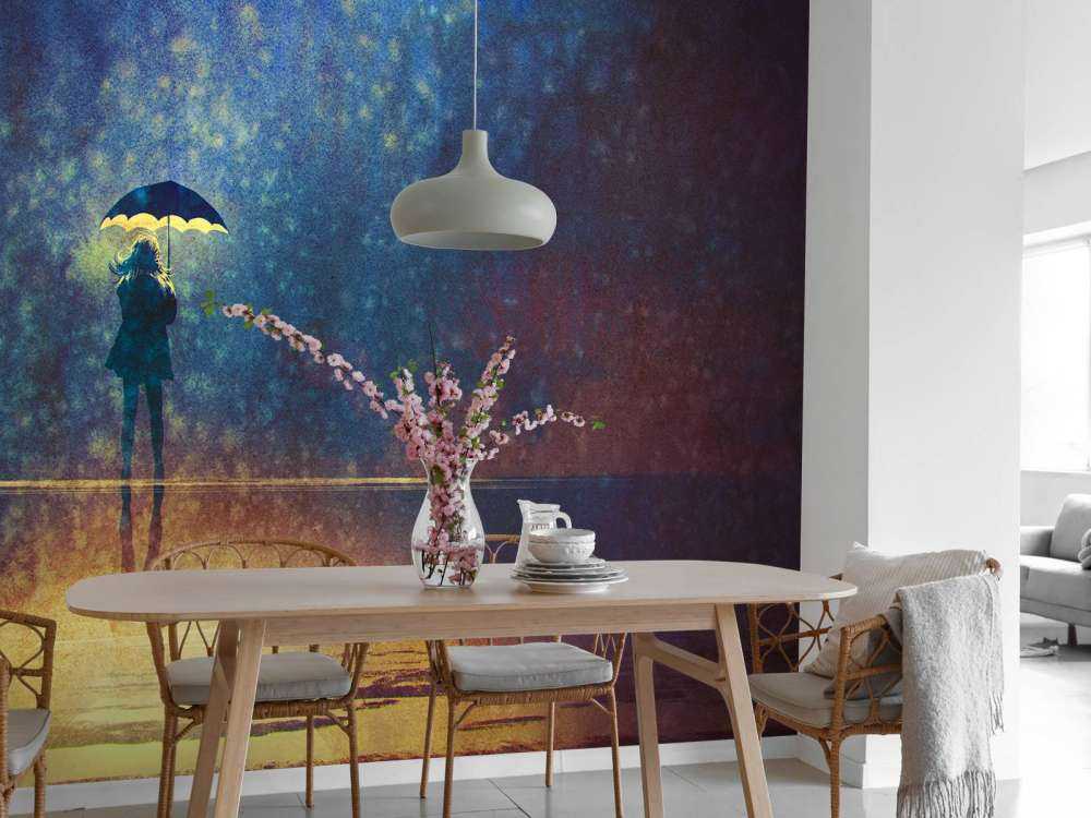 Ragazza sola sotto la pioggia