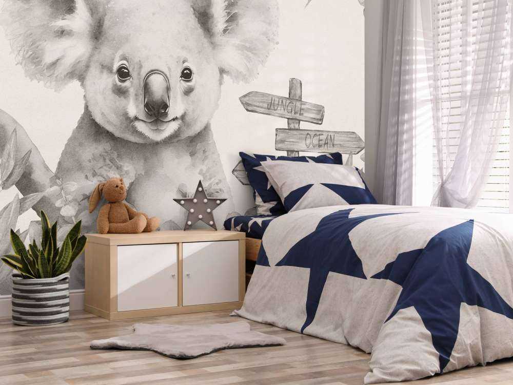 Baby koala nella giungla beige