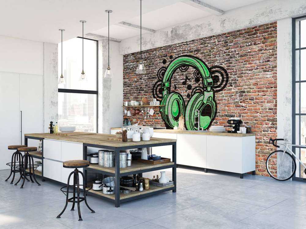 Graffiti su un vecchio muro di mattoni