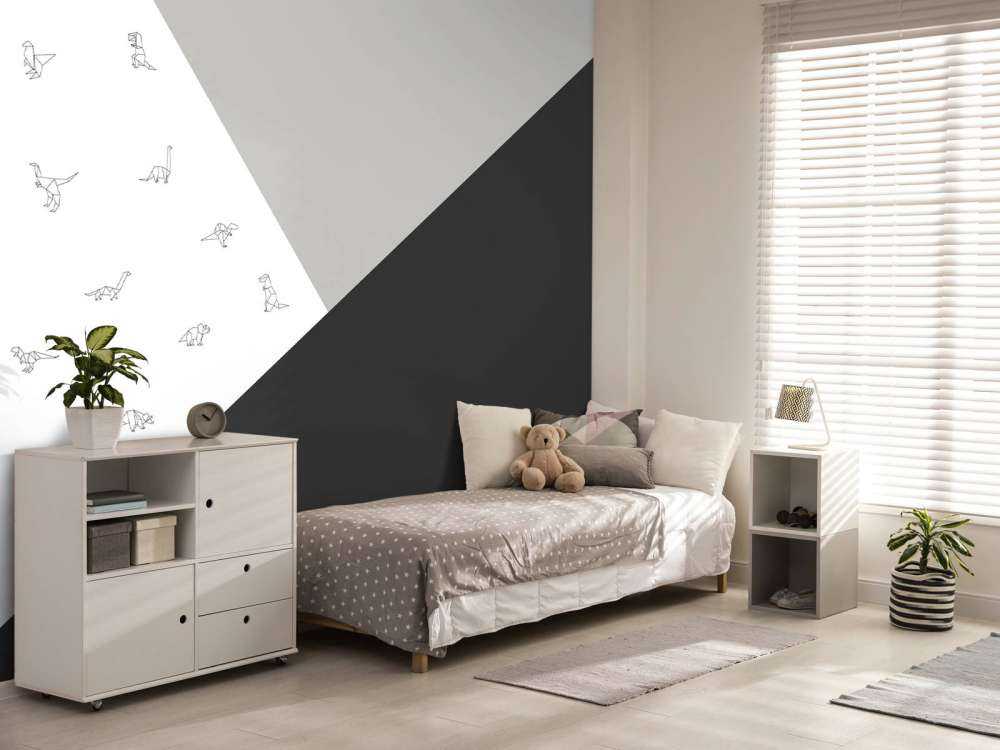 Triangoli bianchi e neri con i dinosauri