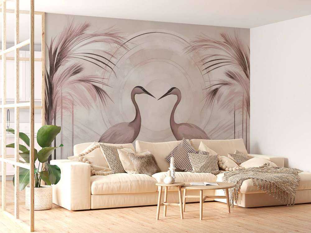 Gru al tramonto rosa