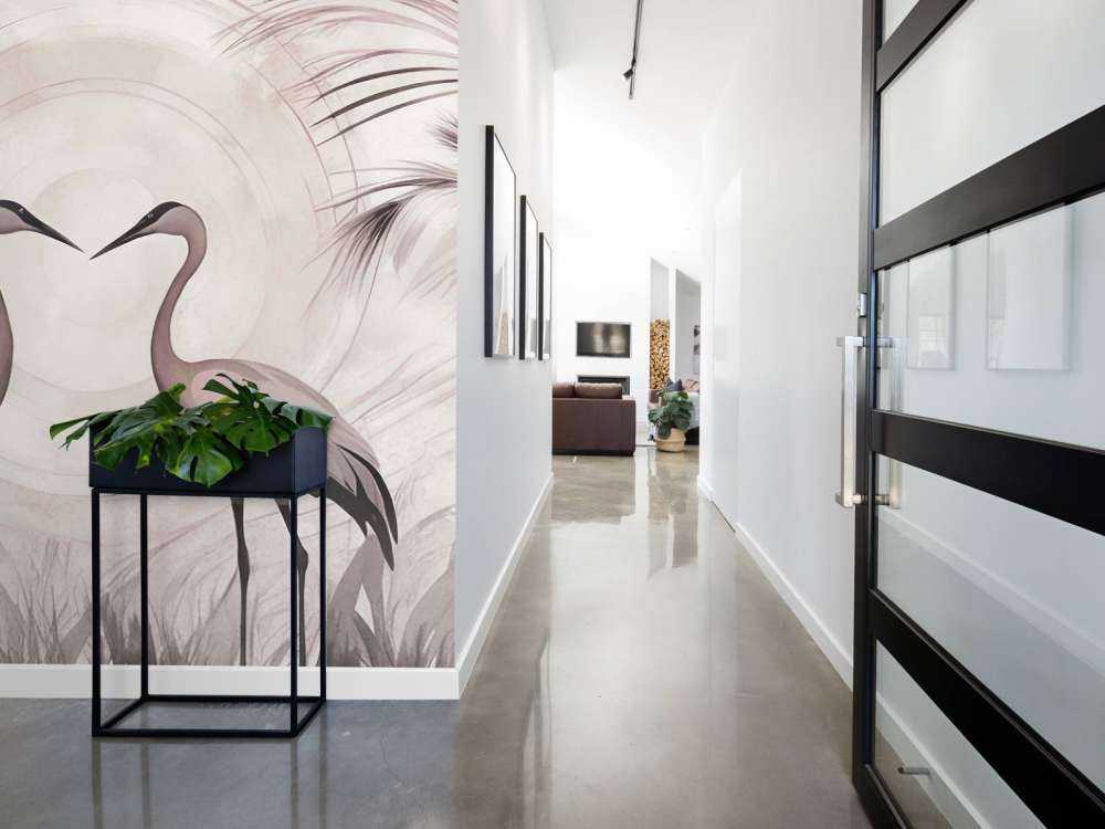 Gru al tramonto rosa