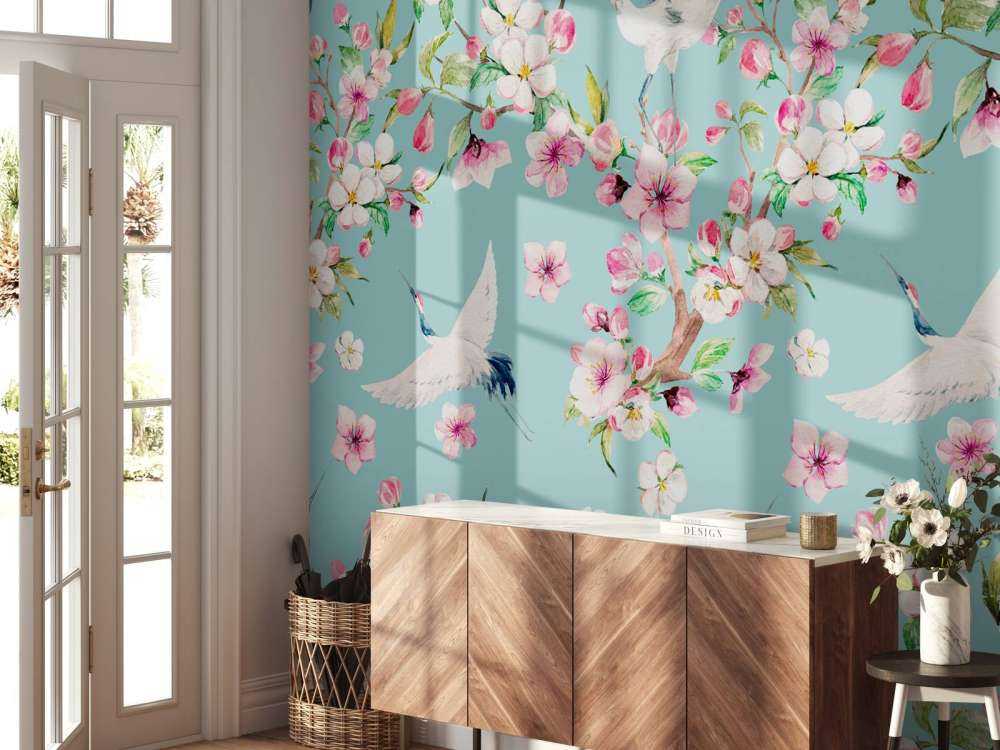 Gru tra i fiori rosa