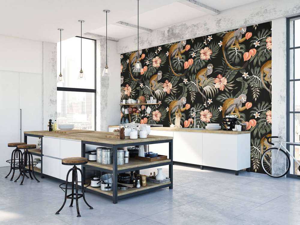 Foglie tropicali con le scimmie