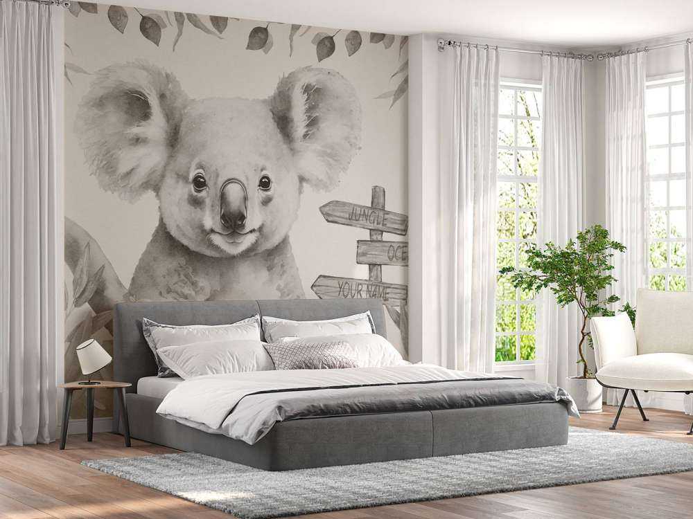 Baby koala nella giungla beige