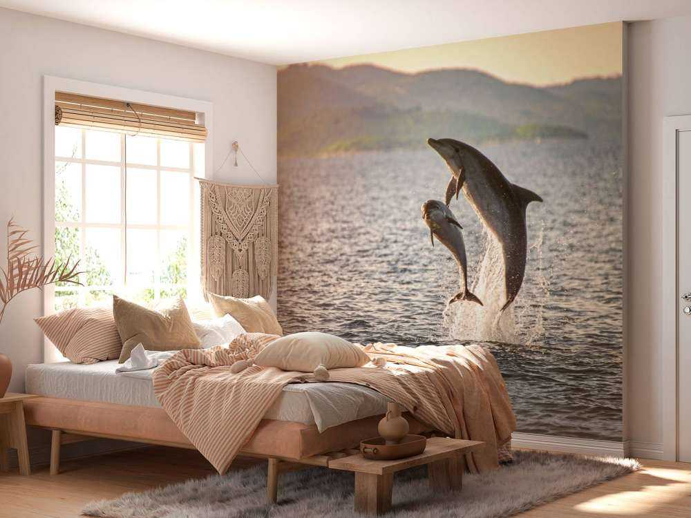 Due delfini che saltano