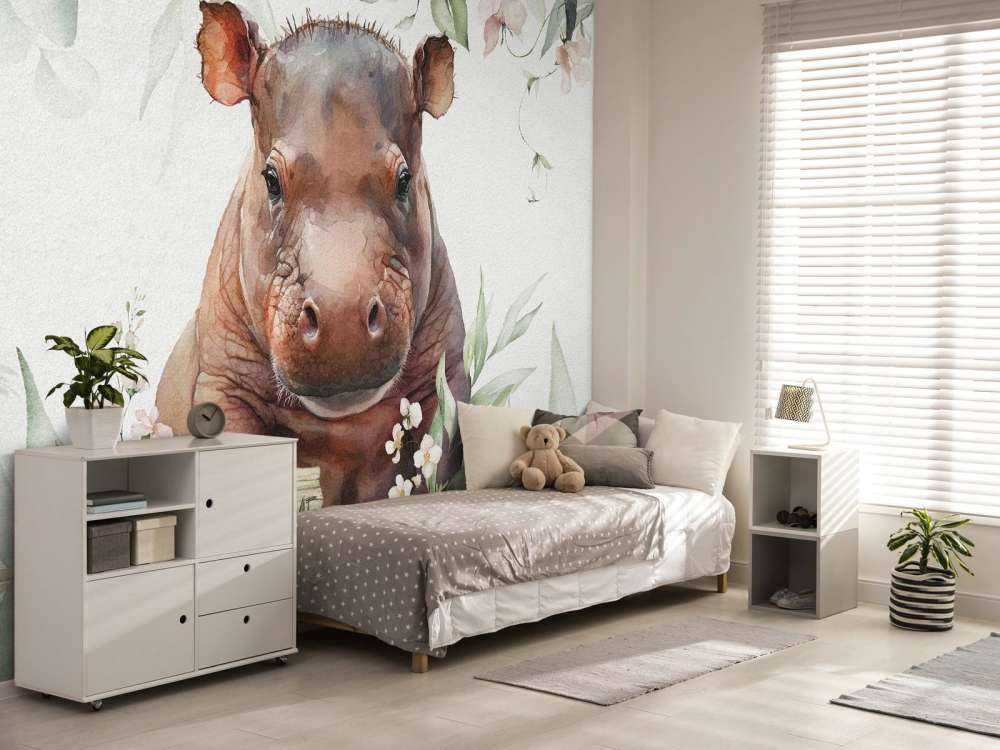 Baby ippopotamo tra le foglie