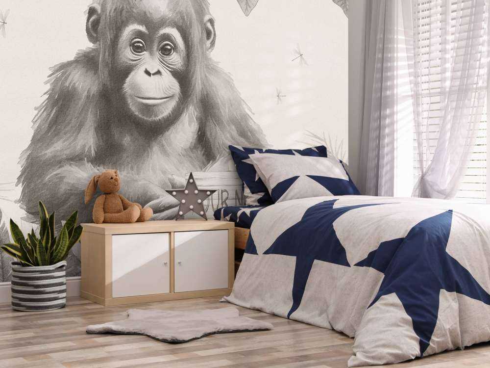 Cucciolo di orango nella giungla beige