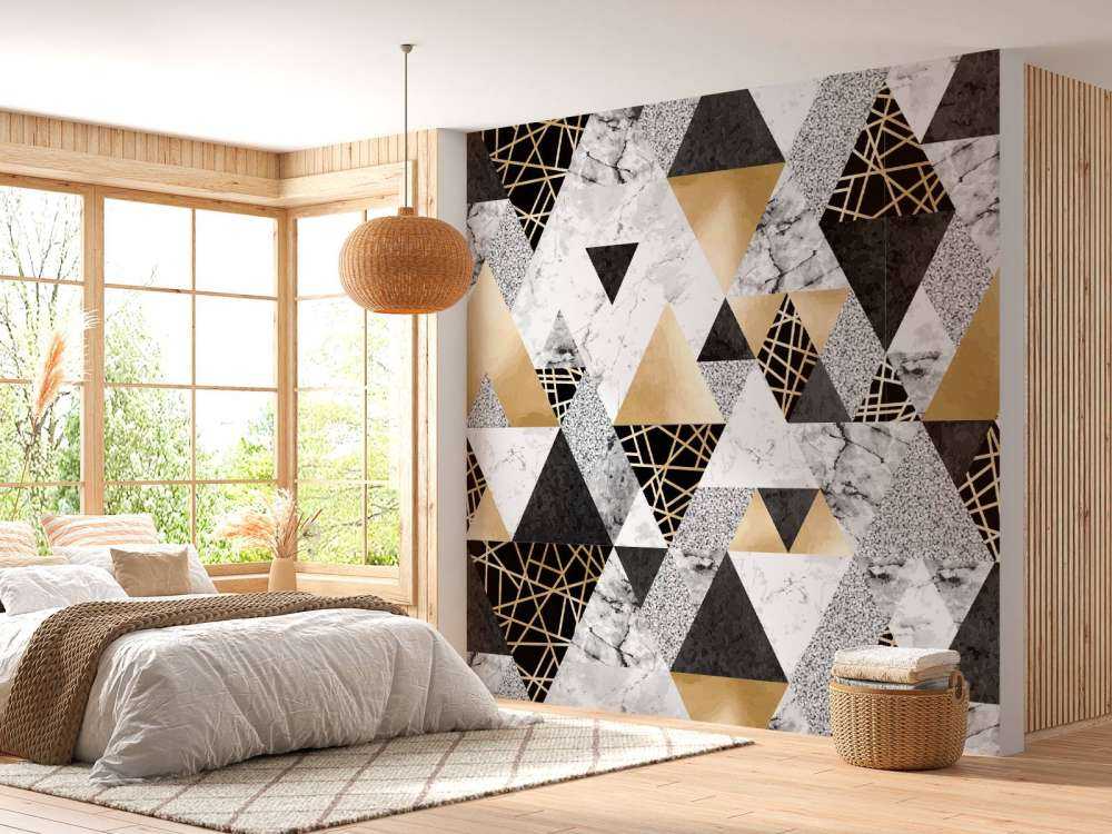 Triangoli di marmo con oro