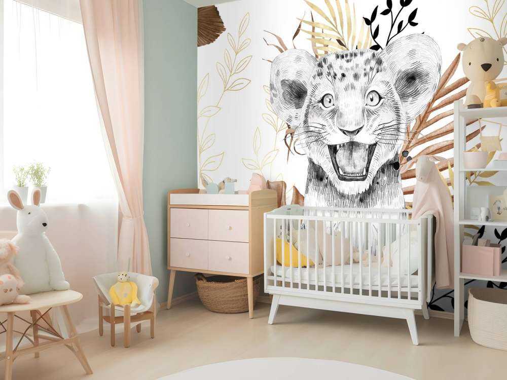 Cucciolo di leone marrone e con foglie d'oro