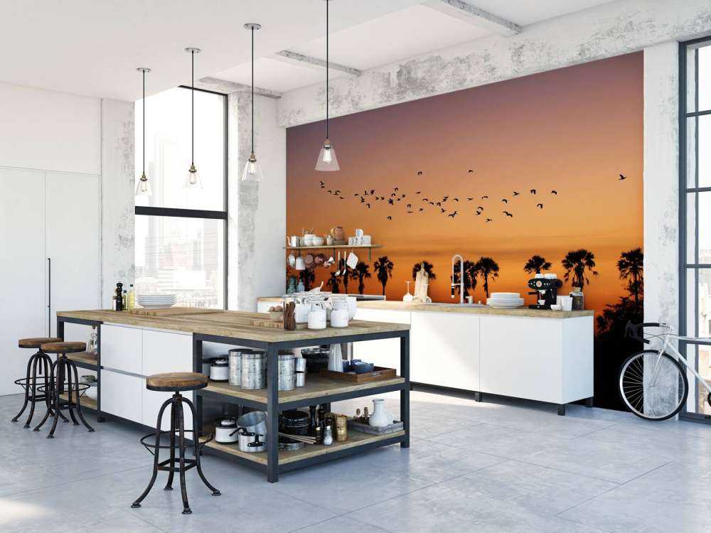 Palme con gruppo di uccelli