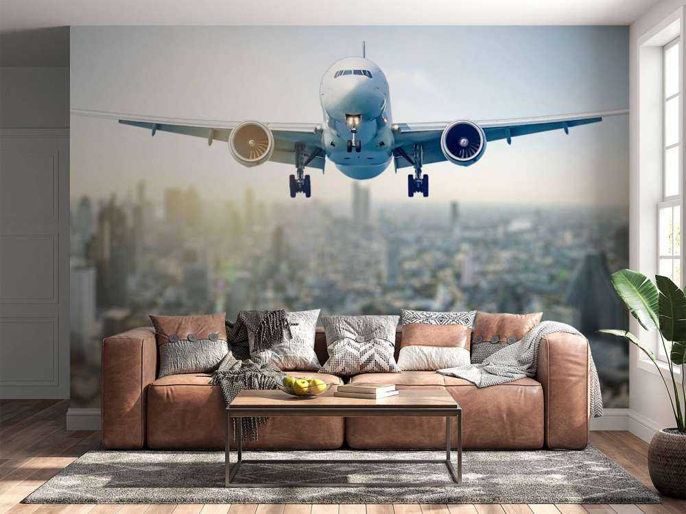 Aereo in discesa sopra una città