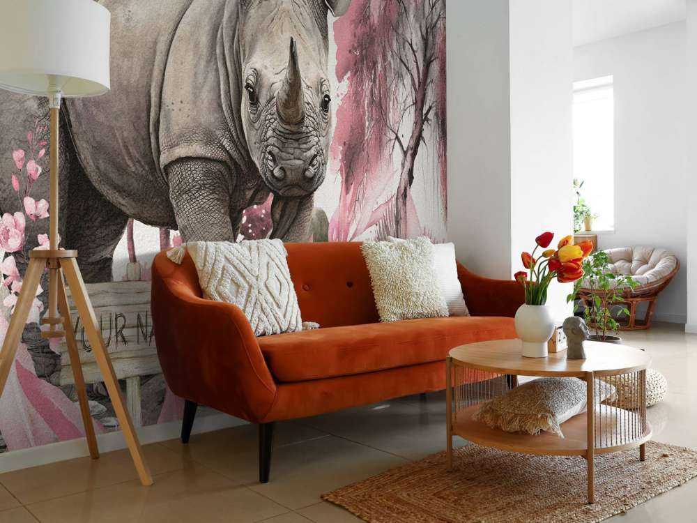 Baby rinoceronte nella savana rosa