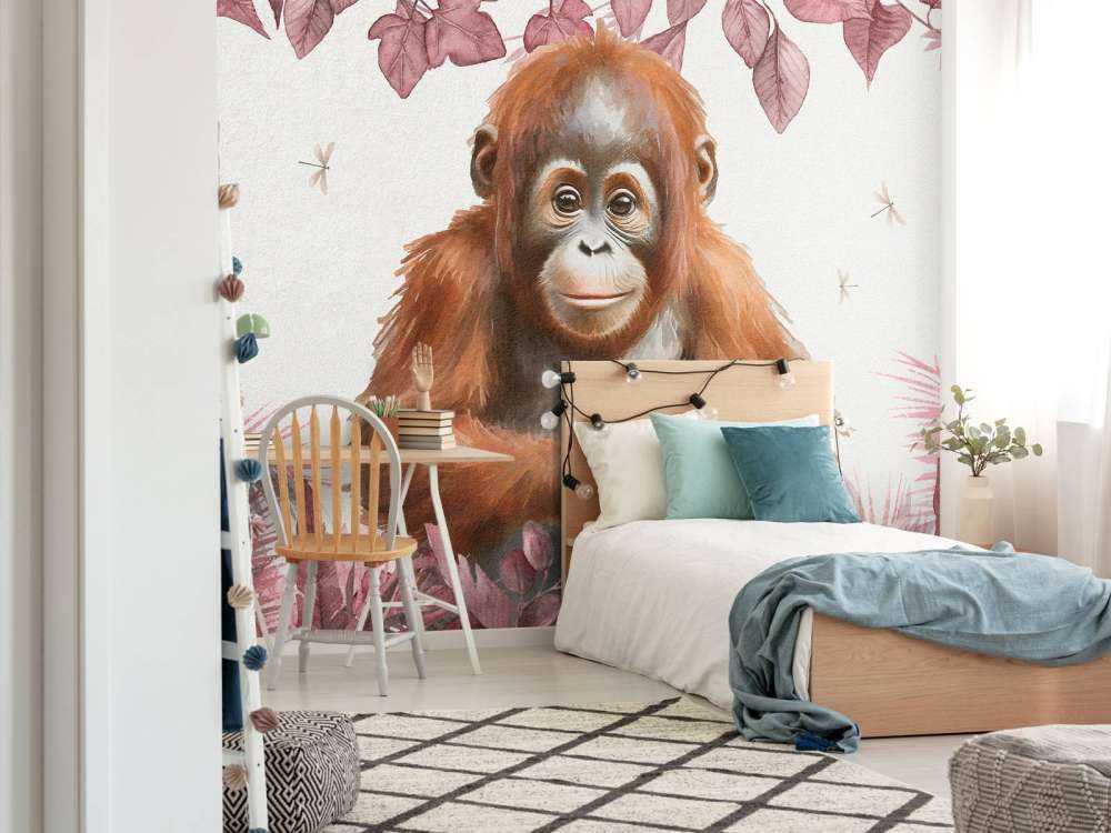 Giovane orango nella giungla rosa