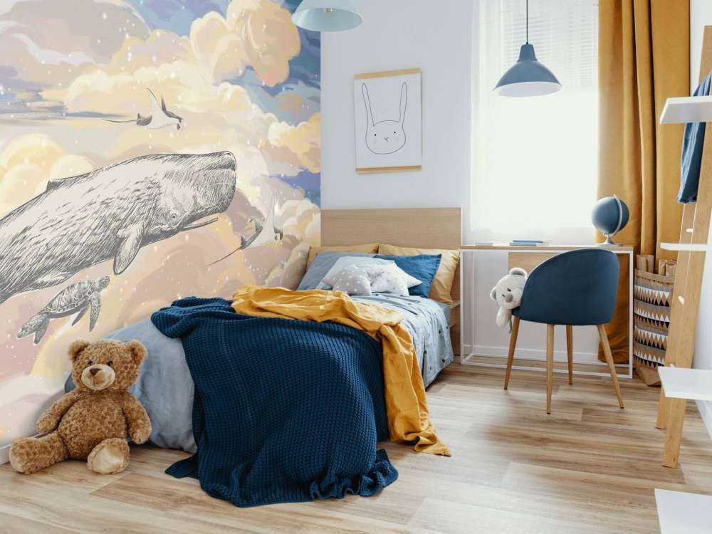 Balena che nuota tra le nuvole