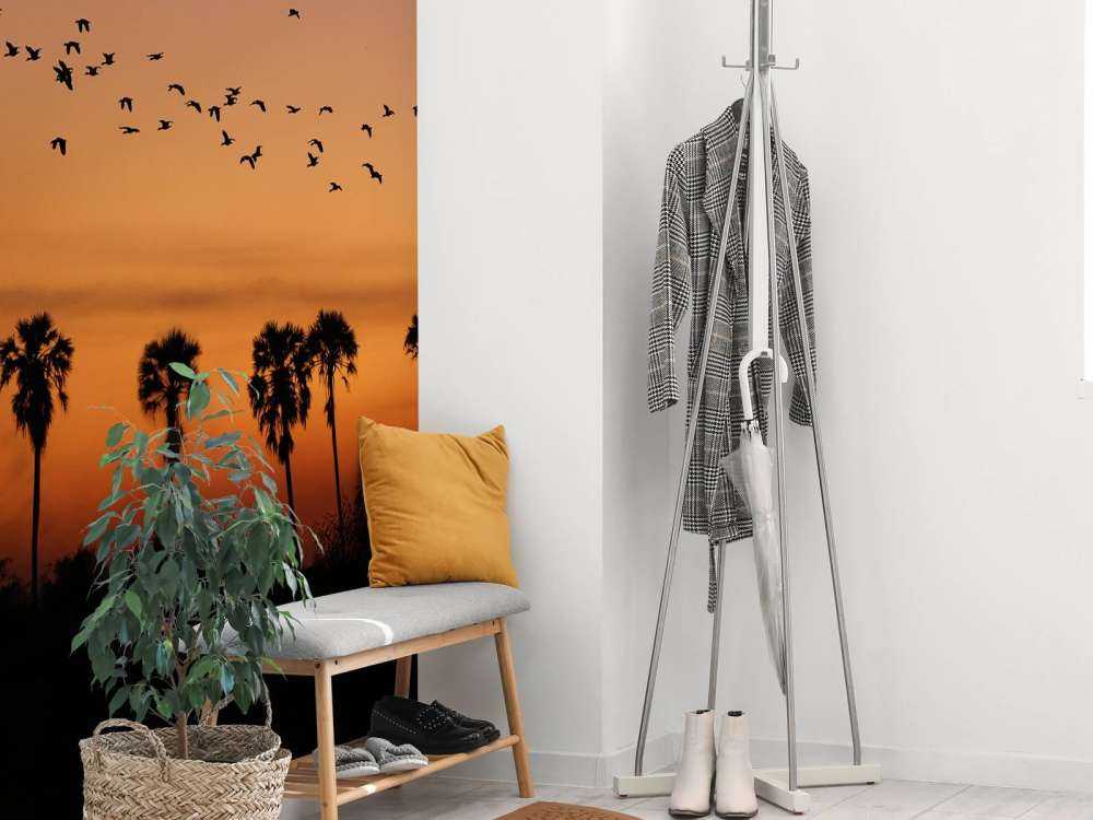 Palme con gruppo di uccelli