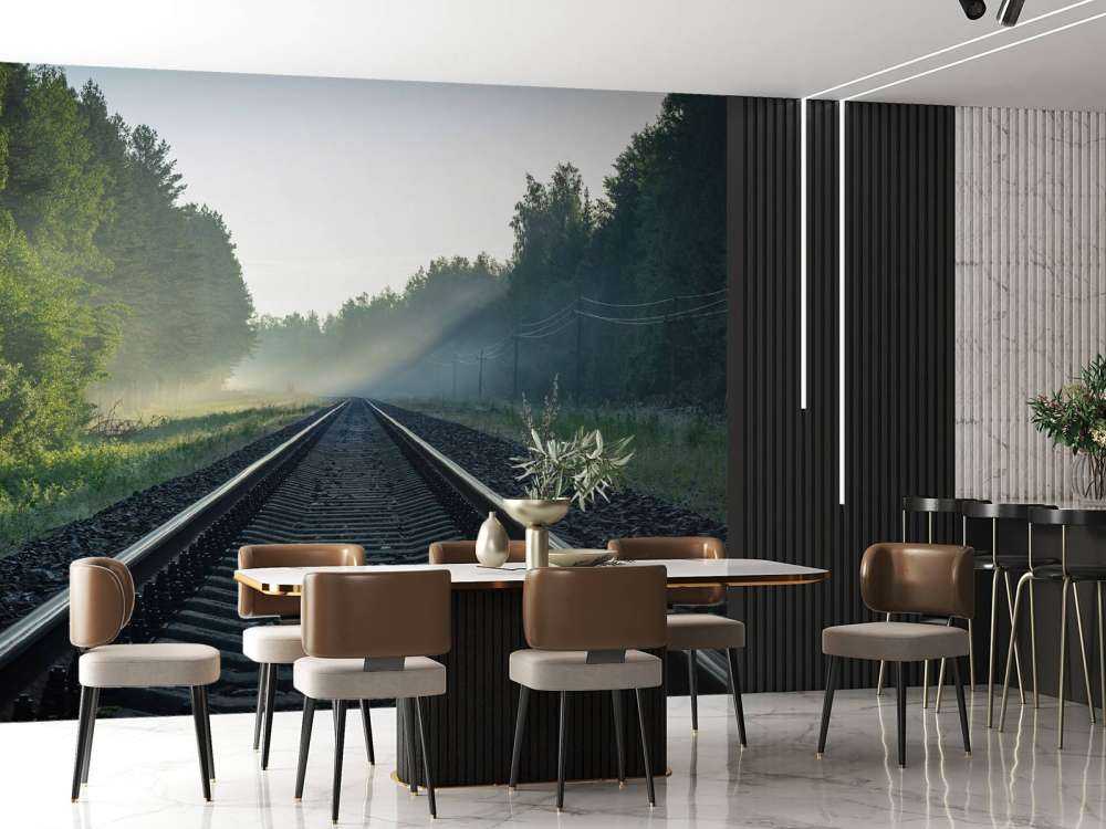 Binari del treno attraverso la foresta