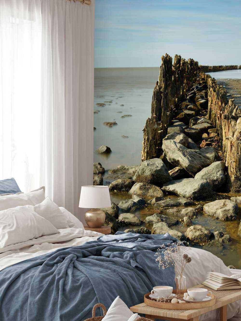 Frangiflutti di legno e pietra