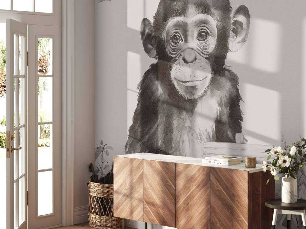 Baby scimpanzé nella giungla beige