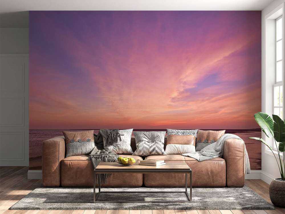 Spiaggia con tramonto rosa