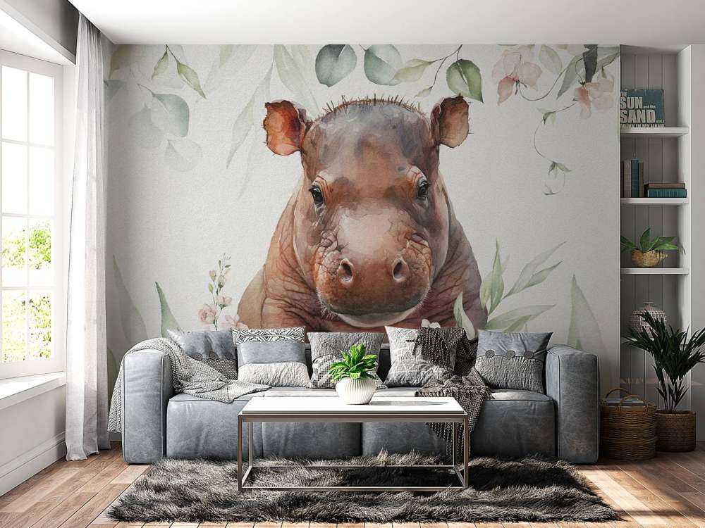 Baby ippopotamo tra le foglie