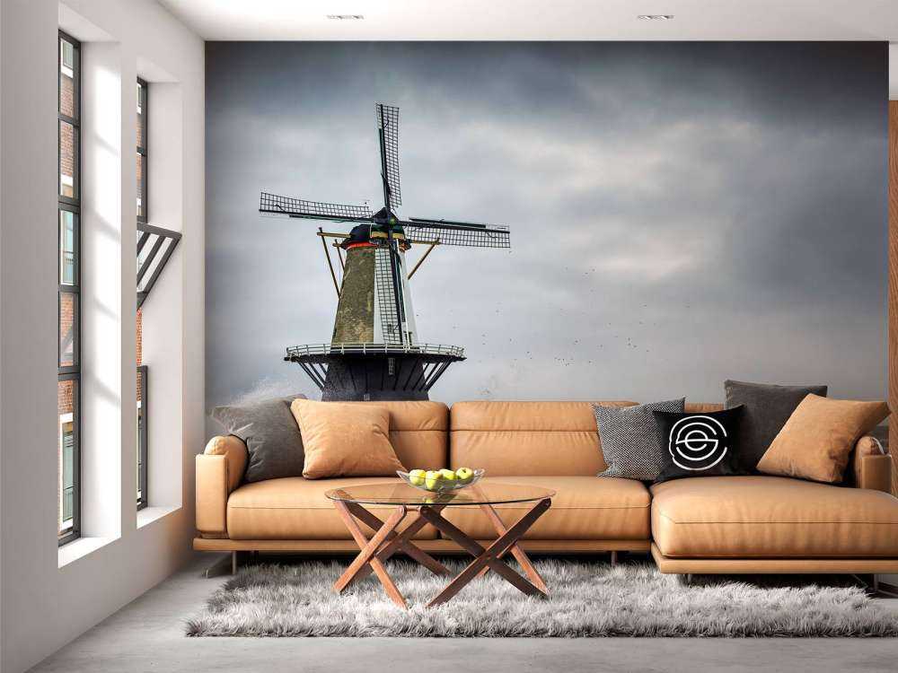 Mulino con onde di tempesta