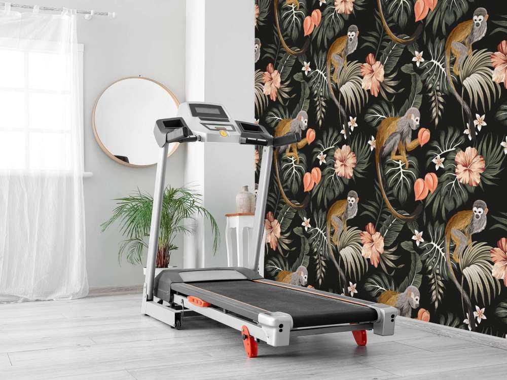 Foglie tropicali con le scimmie