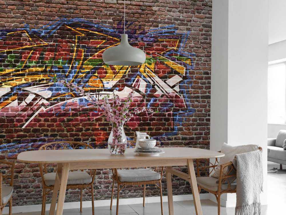 Graffiti su muro di mattoni