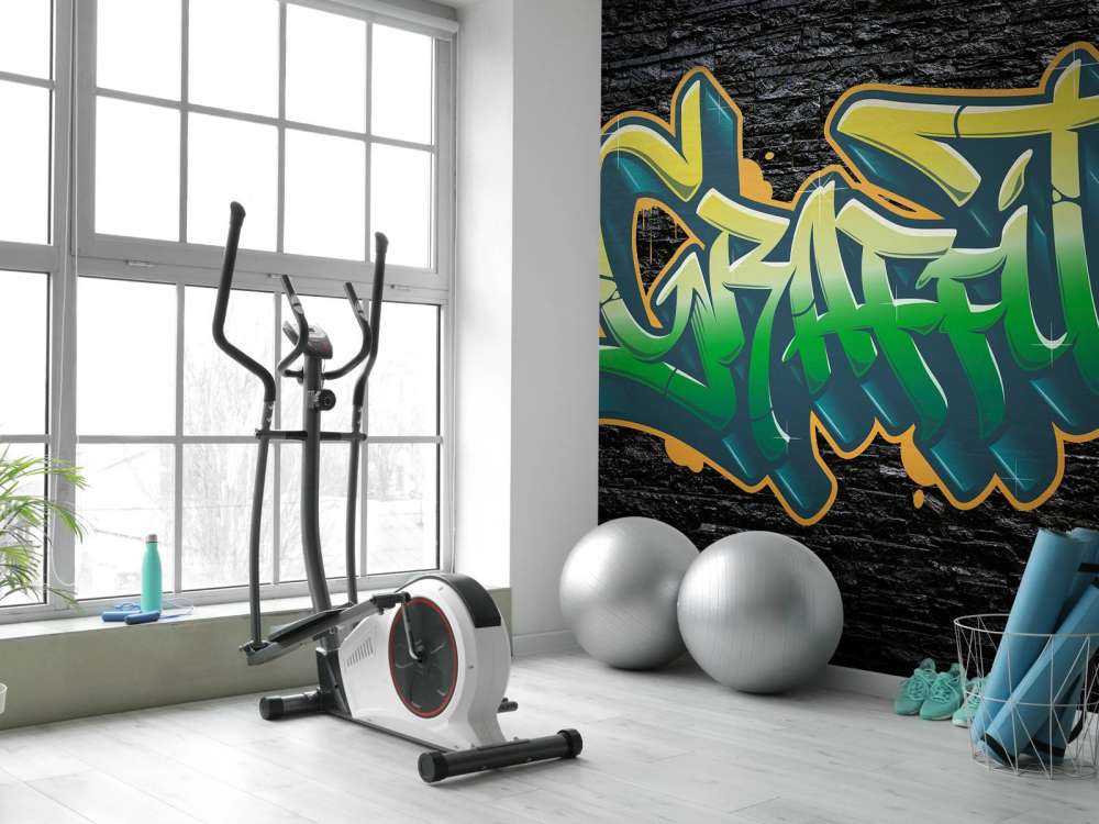 Graffiti su un muro di mattoni neri