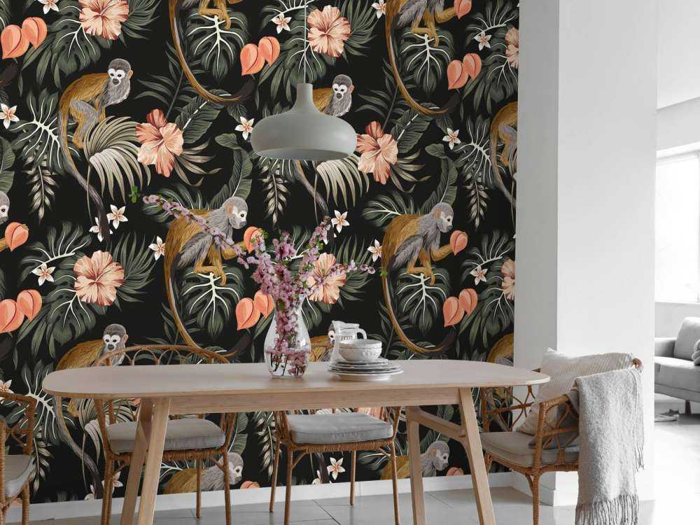 Foglie tropicali con le scimmie