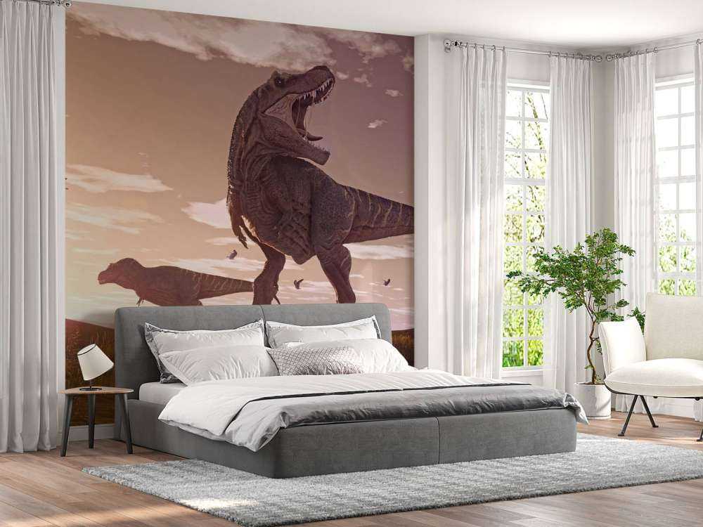 Due tirannosauri in un campo