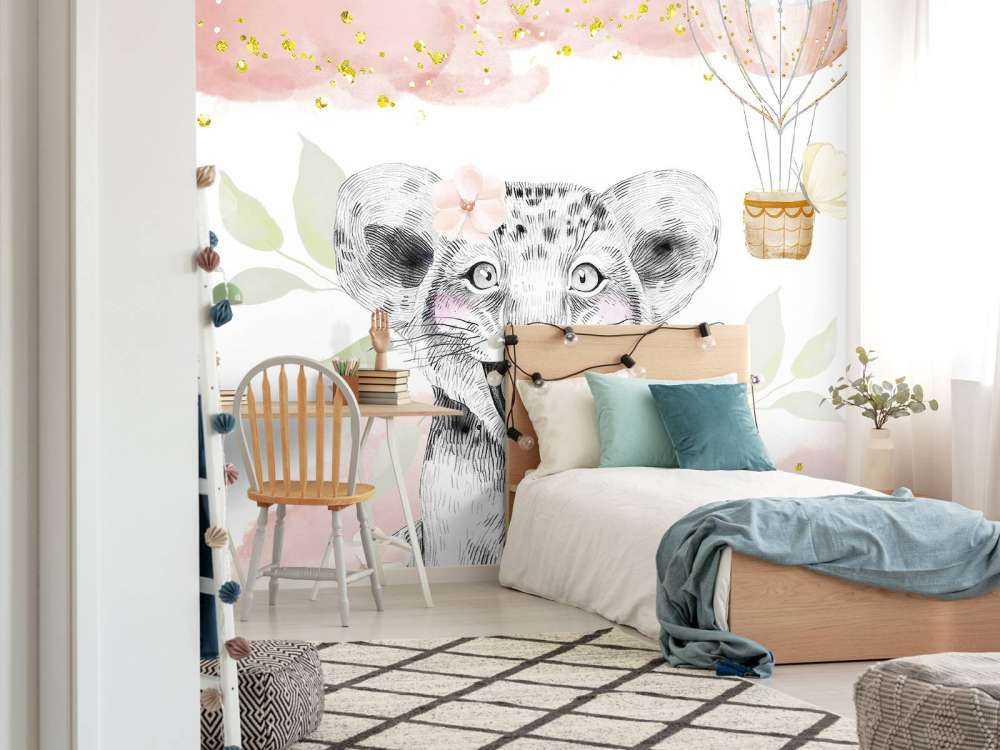 Cucciolo di leone allegro e palloncino