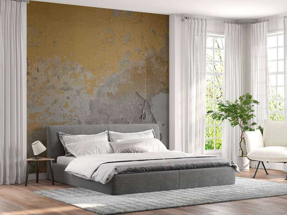 Muro giallo invecchiato