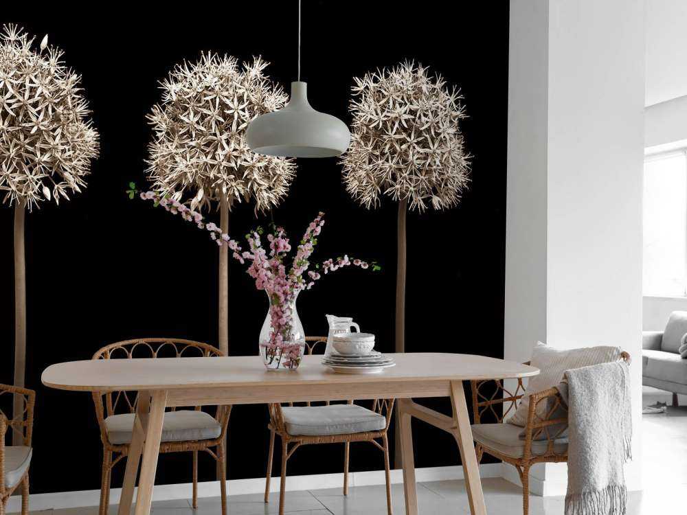 Tre fiori di allium in fila