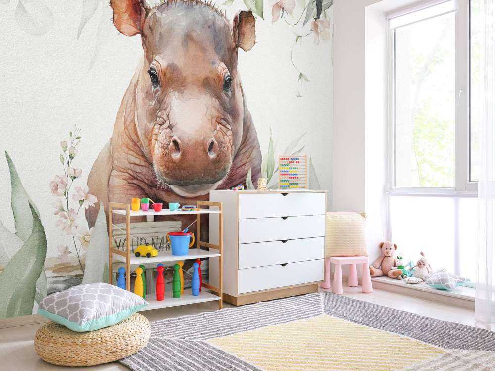 Baby ippopotamo tra le foglie