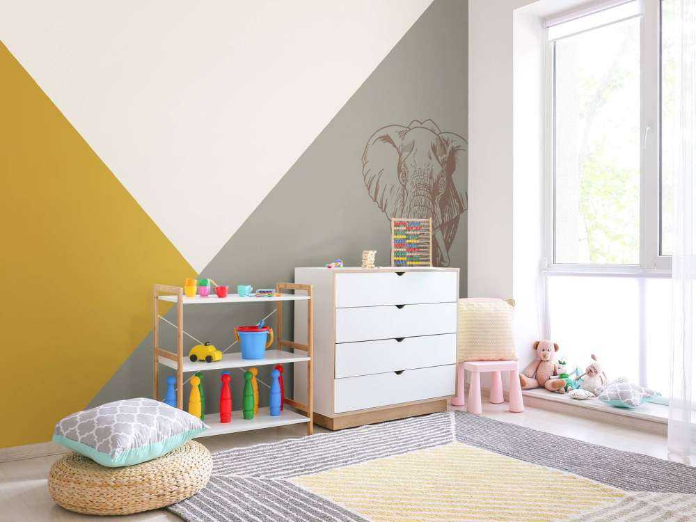 Triangoli in giallo ocra e verde ocra con elefante